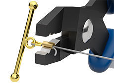 Crimping pliers about to crimp tube